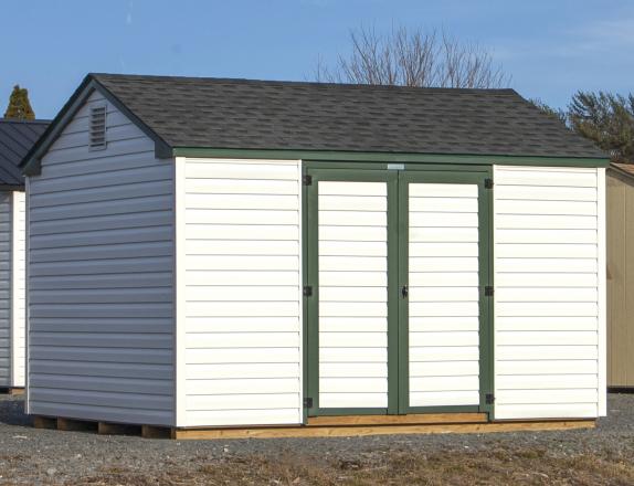 10x12 Economy Peak Storage Shed with vinyl siding for sale at Pine Creek Structures of Spring Glen