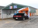 18x21 Carport with Green roof and sides